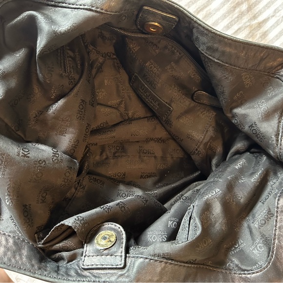 Adorable large black Michael Kors purse with soft leather gold hardware. - Picture 4 of 7
